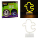 A Ghostly Ghouls neon lamp LED light shaped like a ghost, shown in its retail packaging, illuminated glowing in the dark, and as a white unlit plastic version on a white background.