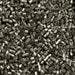 Close-up of small metallic beads in a pile
