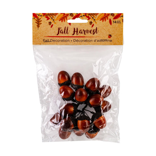 Pack of 14 decorative acorns in a clear plastic bag with a brown cardboard header card labeled 'Fall Harvest'.
