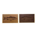 Two wooden coasters with engraved fish designs on a white background