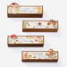 Set of four wooden boxes with mushroom and nature-themed designs on a white background