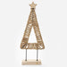 A decorative minimalist Christmas tree sculpture made from woven natural fiber, featuring a star topper and a rectangular wooden base on thin metal legs, shown against a plain light gray background.