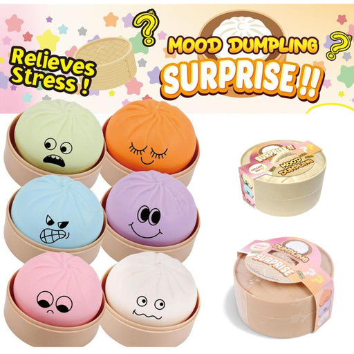 Six cute, squishy dumpling toys in different pastel colors with funny cartoon faces, displayed in their bamboo steamers alongside two sealed mystery packages labeled 'Mood Dumpling Surprise'.