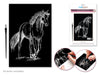 Horse engraving kit with completed artwork and tools on a white background