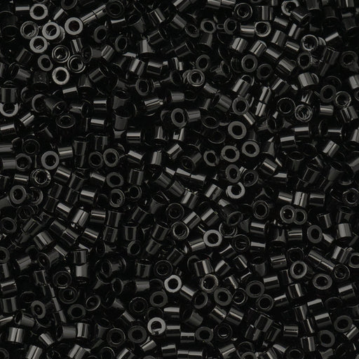 Close-up of black beads on a black background