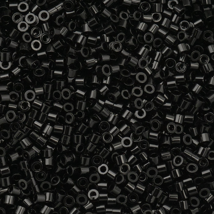 Close-up of black beads on a black background