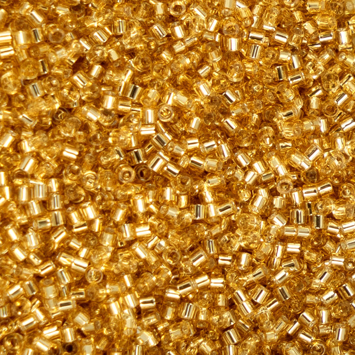 Close-up of small gold beads
