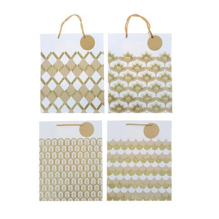 Four white gift bags with gold foil patterns and natural jute handles, arranged in a 2x2 grid on a white background.