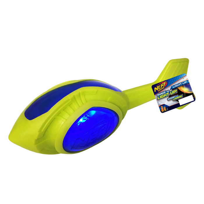 Toy spaceship with blue light and green body on a white background