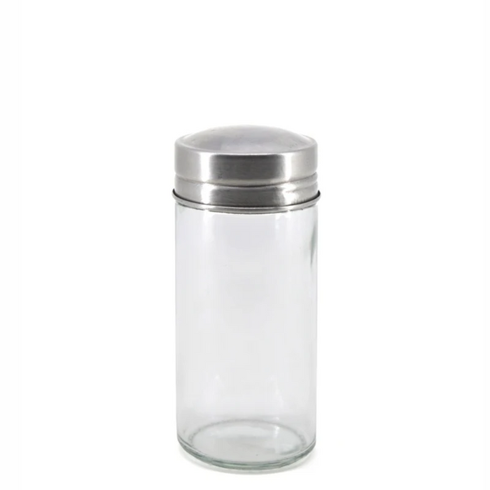 Clear glass jar with a silver lid on a white background