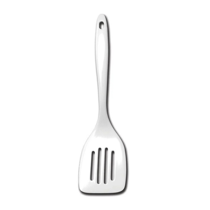 Metallic slotted spatula on a white background