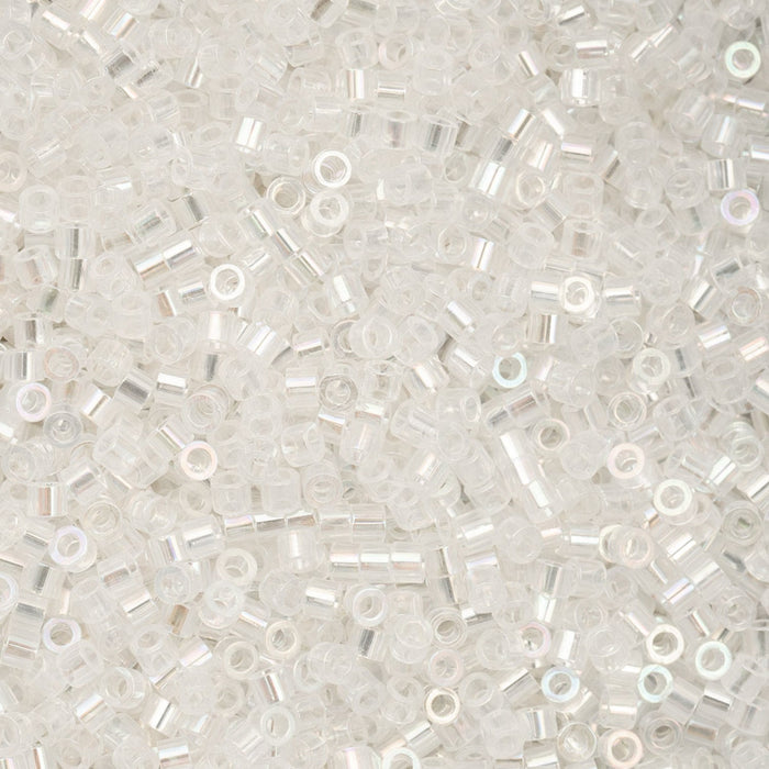 Close-up of small white beads on a light gray background