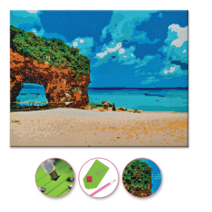 Pixel art canvas with a scenic design of a beach and arch, accompanied by a packaging box.