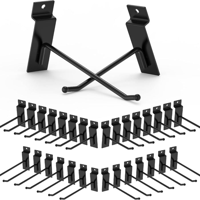 Black metal brackets and hooks on a white background