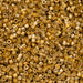Close-up of small gold beads