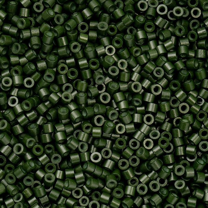 Close-up of green beads arranged in a pattern