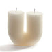 U SHAPED CANDLE WITH 2 WICKS ON A WHITE BACKGROUND