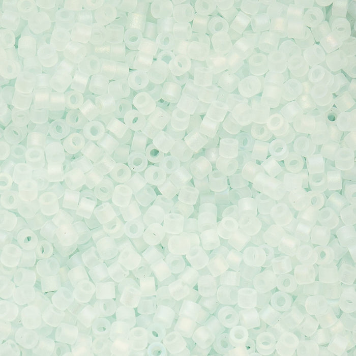 Close-up of light green beads on a light green background