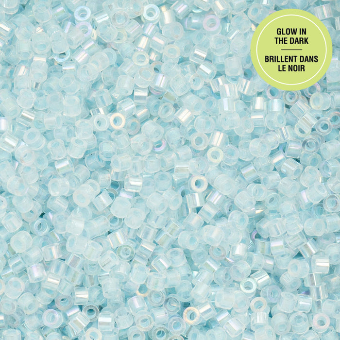 Glow-in-the-dark blue beads with a label on a light blue background