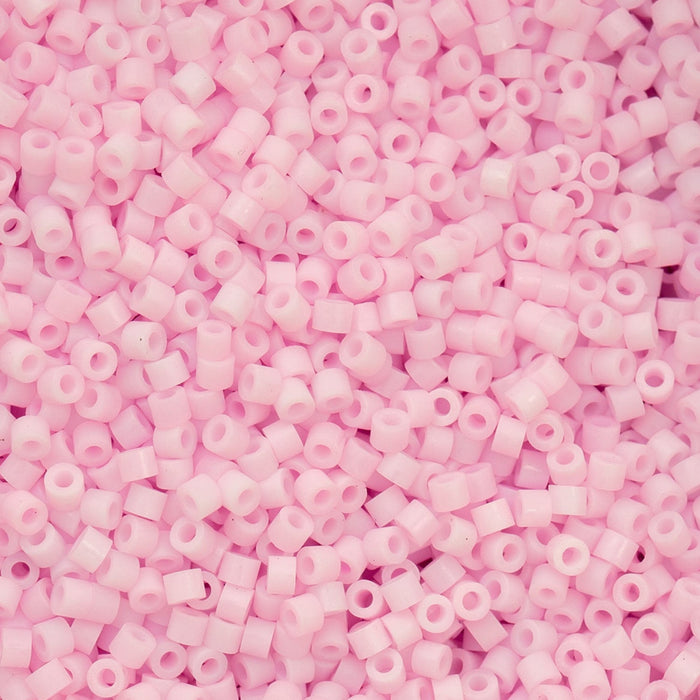 Close-up of pink beads on a pink background