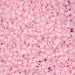 Close-up of pink beads on a pink background