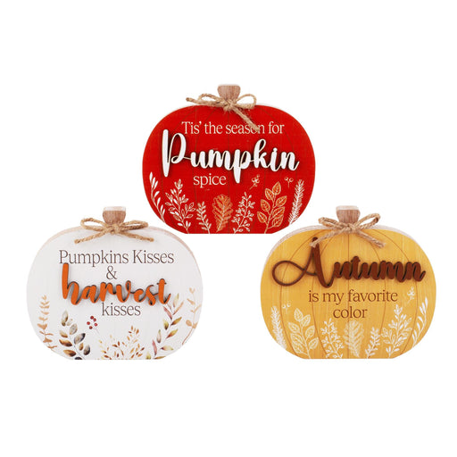 Three autumn-themed decorative pumpkin ornaments on a white background. The top red pumpkin reads 'Tis' the season for Pumpkin spice', the bottom left white pumpkin reads 'Pumpkins Kisses & harvest kisses', and the bottom right yellow pumpkin reads 'Autumn is my favorite color'.