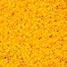 Close-up of a large pile of yellow plastic beads