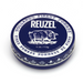 A round blue tin of Reuzel Hair Pomade on a clean white background, featuring a white illustration of a pig and the brand name 'REUZEL' in bold white letters.