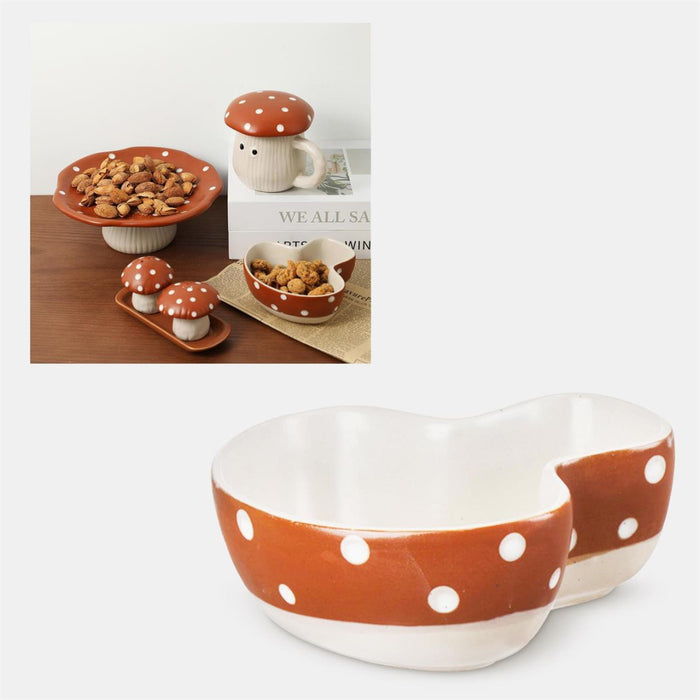 Ceramic bowl with polka dot design on a white background