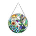 Colorful stained glass panel with a hummingbird and flowers on a white background