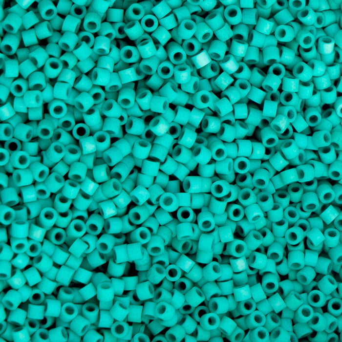 Turquoise plastic beads densely packed together