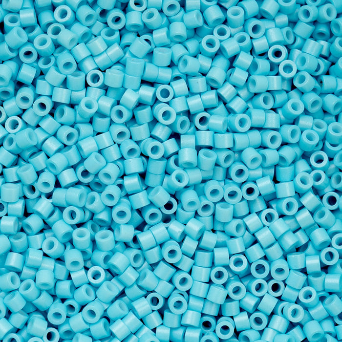 Close-up of blue beads with a uniform size and shape.