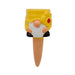 Gnome-shaped garden stake with a yellow hat and red nose on a white background