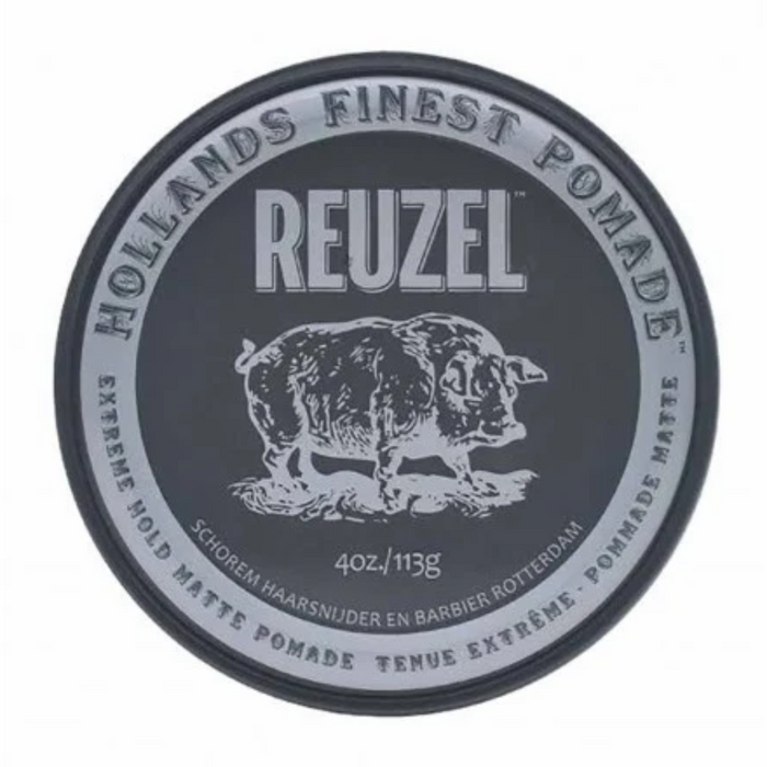 A round black and gray container of Reuzel pomade on a plain white background, featuring a pig illustration and the text 'Hollands Finest Pomade'.