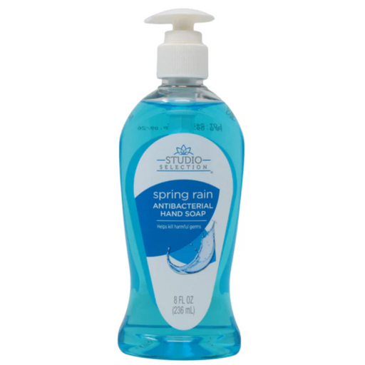 Bottle of Studio Selection Spring Rain antibacterial hand soap on a white background