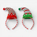 Two festive elf hat headbands on a white background. One is red and white striped with green accents and rhinestones, and the other is silver and white striped with green accents and rhinestones.