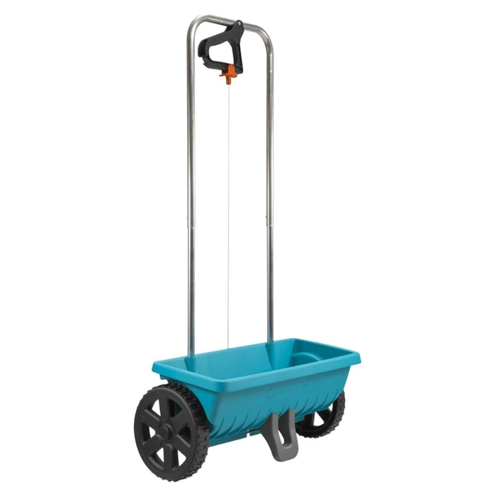 Blue garden spreader with a handle on a white background
