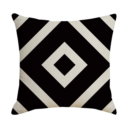 Decorative pillow with black and white geometric pattern on a white background
