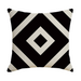 Decorative pillow with black and white geometric pattern on a white background