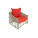 Wicker chair with red cushions on a white background