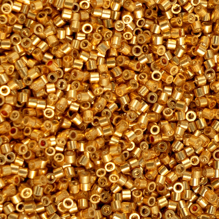 Close-up of small gold beads