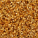 Close-up of small gold beads