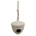 Ceramic birdhouse with a rope attachment on a white background