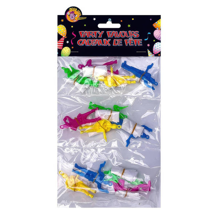 Packaged party favours with colorful items on a white background