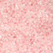 Close-up of small pink beads with a soft focus