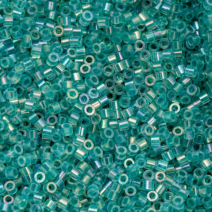 Close-up of turquoise glass beads with silver cores.
