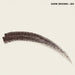 A dark brown eyebrow or eyeliner swatch brush stroke on a plain white background, with the text 'DARK BROWN - 001' in the top right corner.