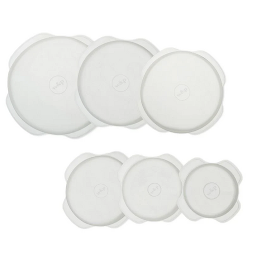 Set of white circular objects on a white background