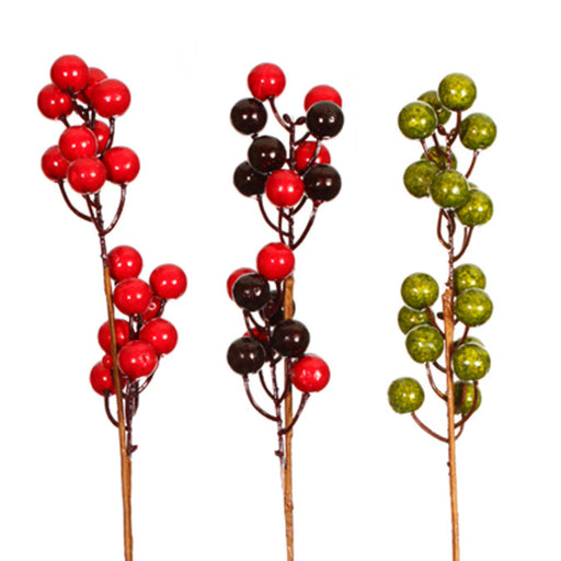 Three decorative berry sticks in red, black, and green on a white background