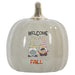 A glossy ceramic decorative pumpkin with a metallic gold stem, featuring a 'WELCOME FALL' gnome illustration on the front.